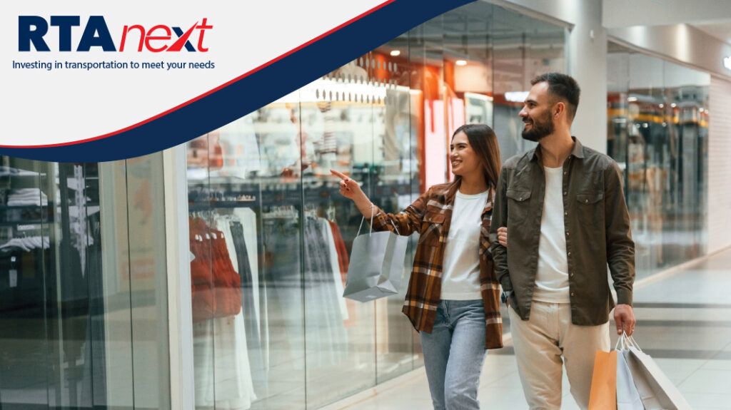 A young couple shopping at the mall.